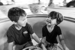 boys ride the Tea Cups at Magic Kingdom
