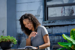 woman writes in her journal