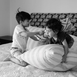pillow fight on mom and dad's bed